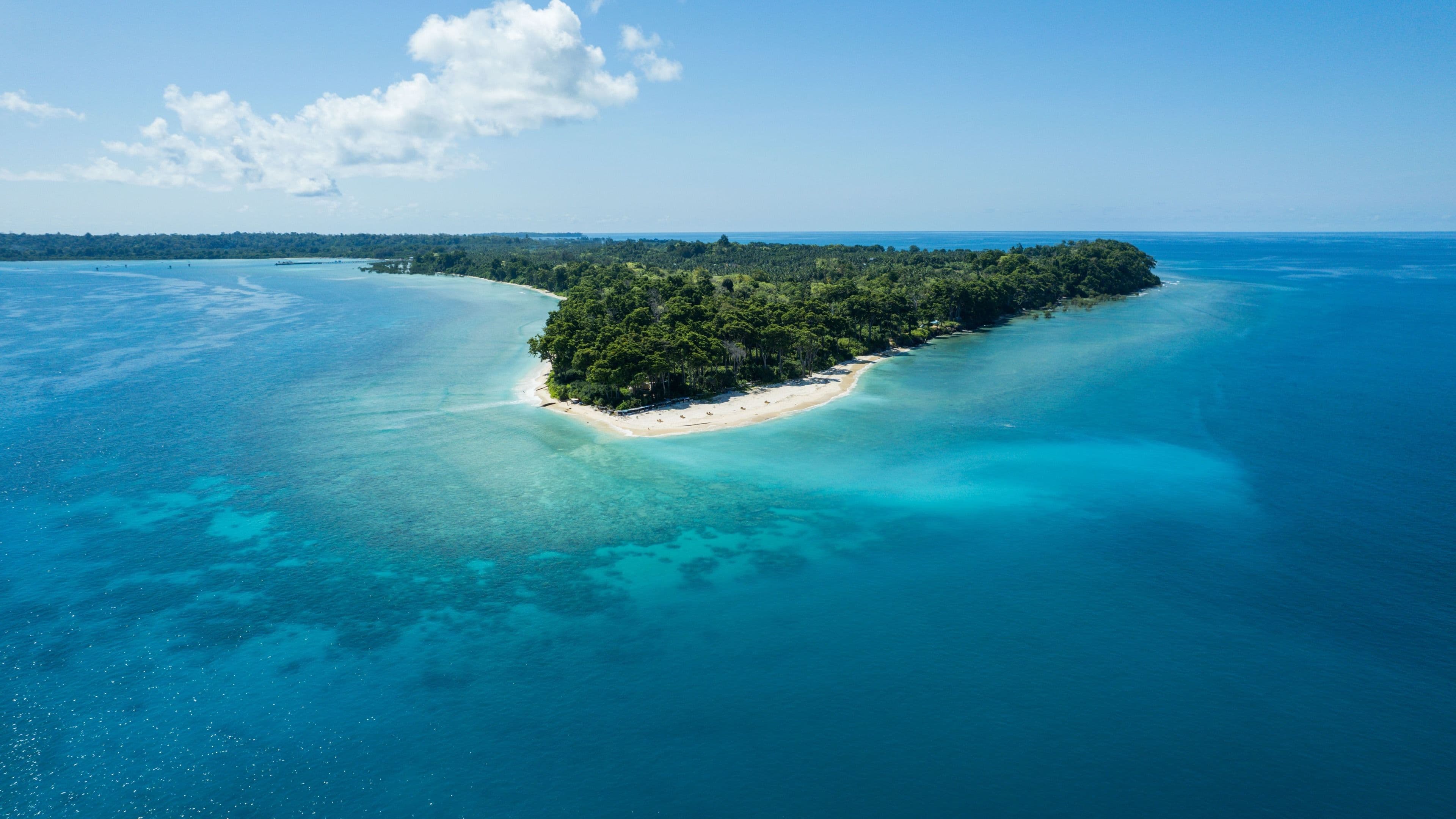 Aerial view of an Andaman island and turquoise shallows