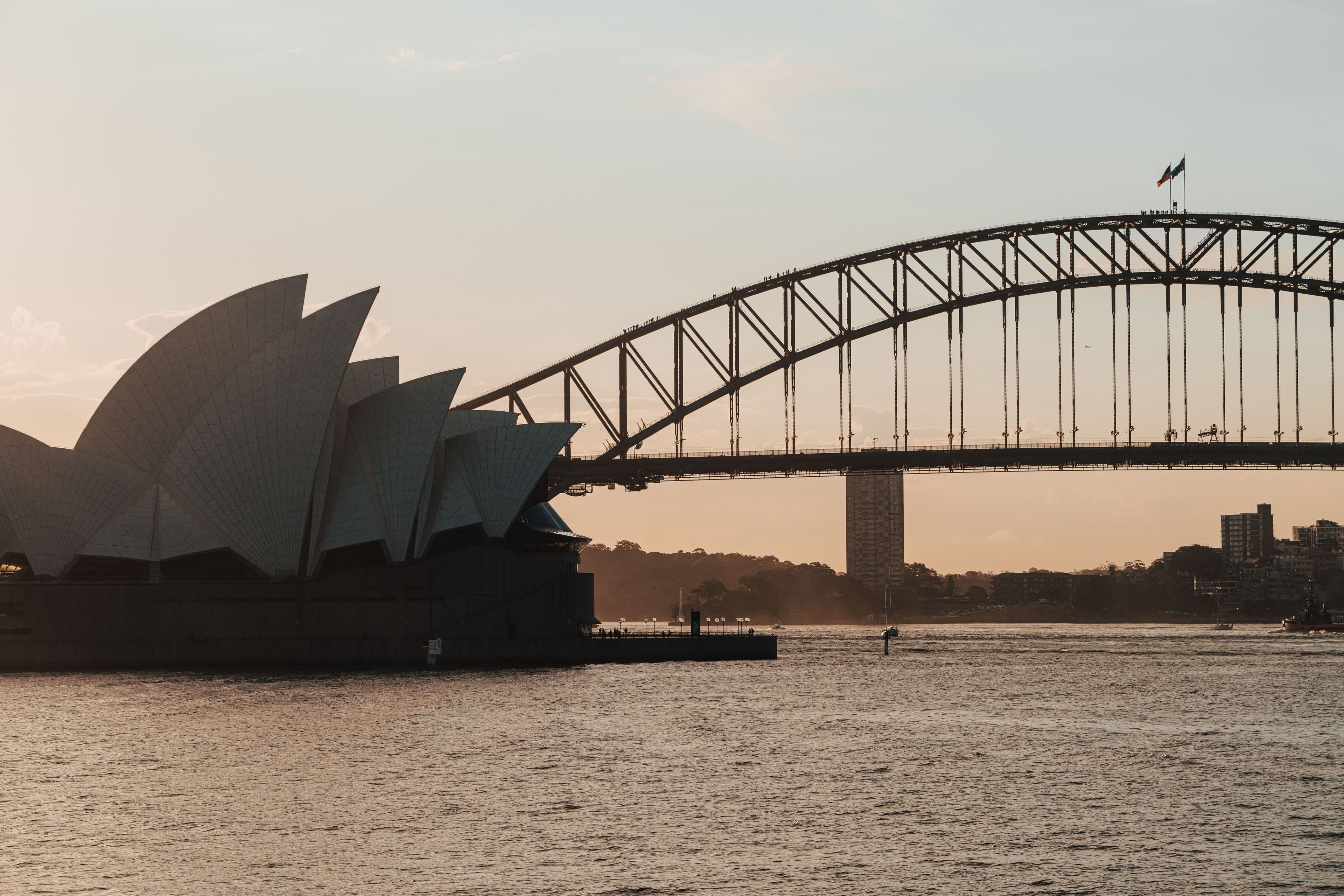 The Sydney Harbour Bridge and Opera House at sunset