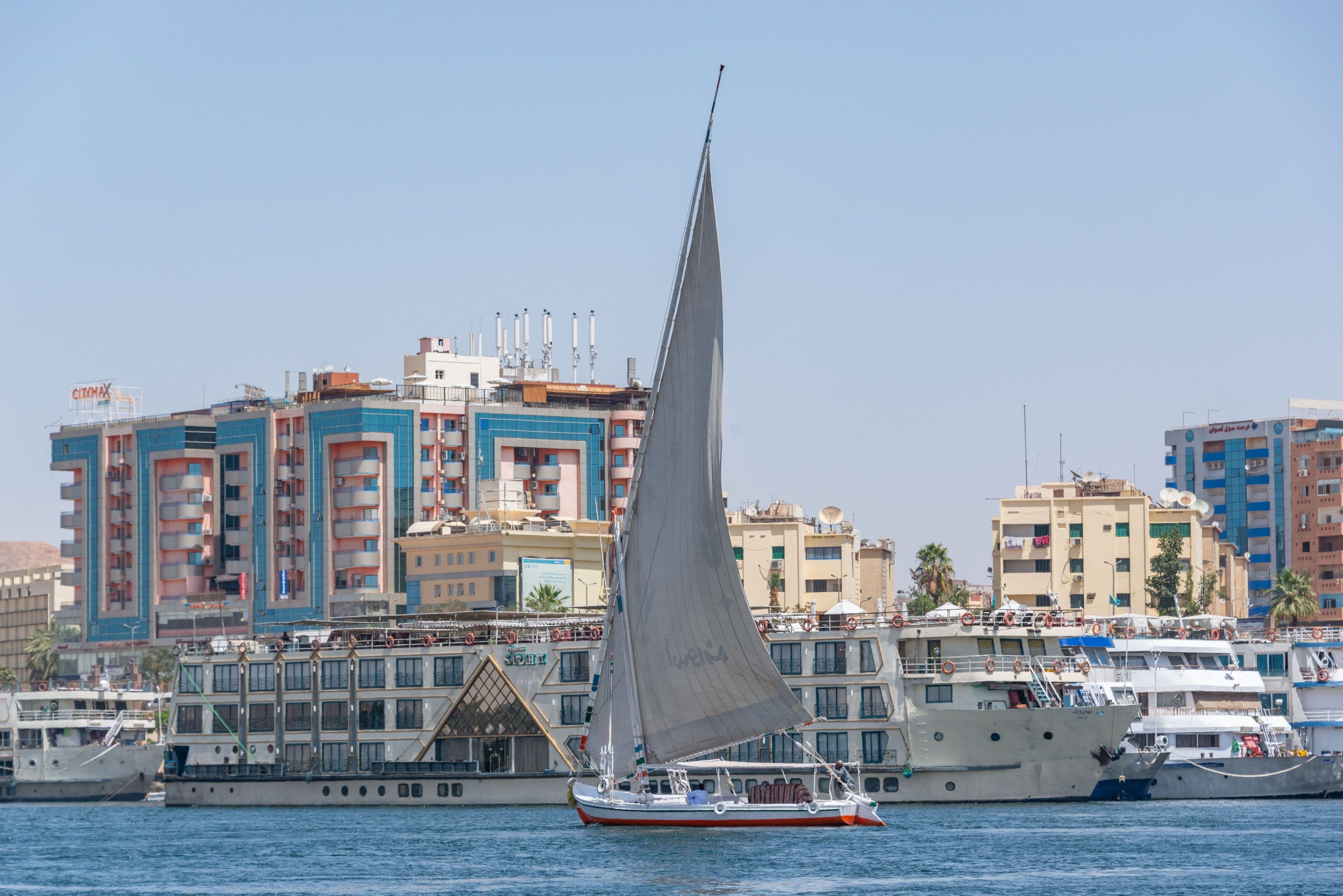 Nile cruise ships and a felucca at Aswan