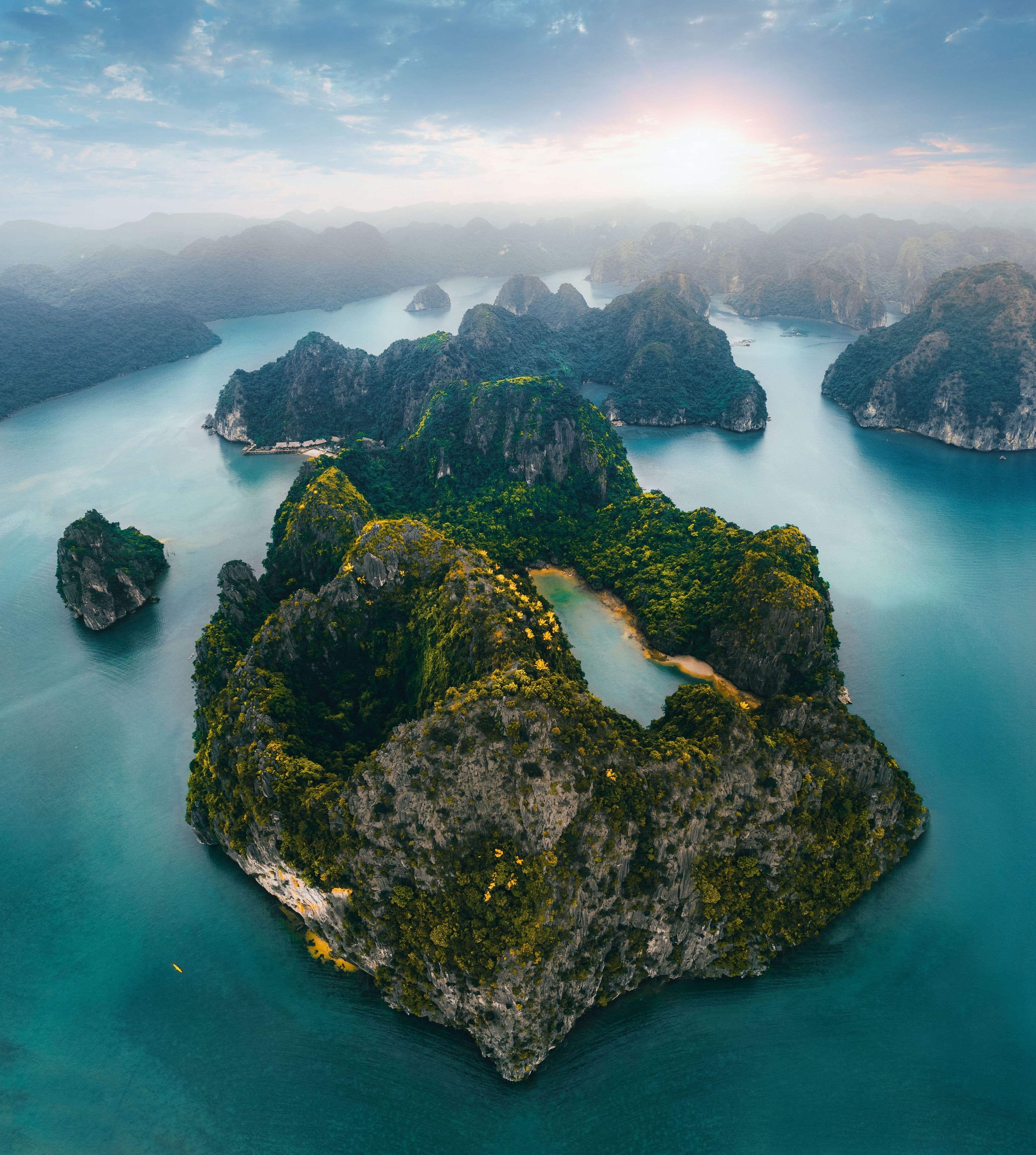 Dawn over the islets of Halong Bay